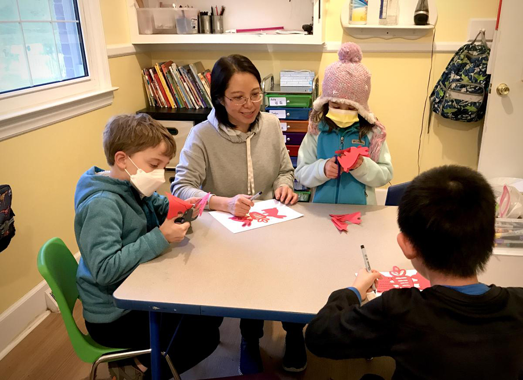 May with her students at RedApple Chinese School